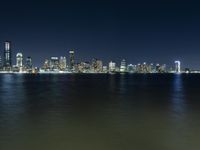 Night View of Manhattan Skyline Overlooking the Lake