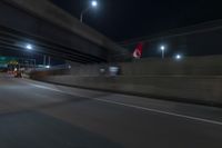 Night view of underpass and bridge in New York City