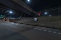 Night view of underpass and bridge in New York City