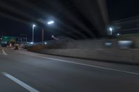 Night view of underpass and bridge in New York City