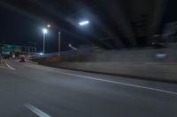 Night view of underpass and bridge in New York City