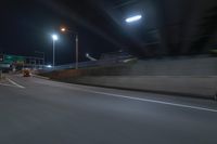 Night view of underpass and bridge in New York City