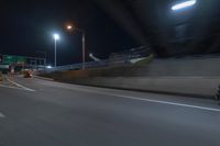 Night view of underpass and bridge in New York City