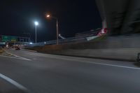 Night view of underpass and bridge in New York City
