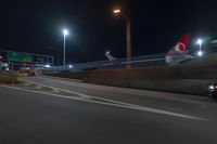 Night view of underpass and bridge in New York City