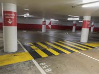 the car park has many lanes painted yellow and red, like this one for parking spaces
