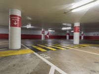 the car park has many lanes painted yellow and red, like this one for parking spaces