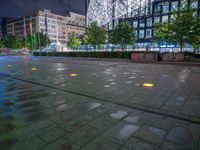 Night View of Wet Road in Berlin's Business District