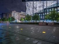 Night View of Wet Road in Berlin's Business District