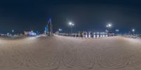 the walkway at night with buildings in the background and a full moon overhead is a mirror effect