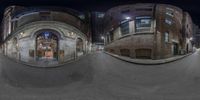 three panoramic views of buildings at night as seen from the street level of the street