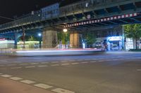 Nighttime in Berlin: Bridge and City Lights