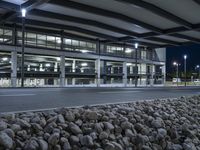 Nighttime in Berlin: A Steel Bridge and Modern Architecture