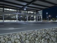 Nighttime in Berlin: A Steel Bridge and Modern Architecture