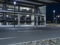 Nighttime in Berlin: A Steel Bridge and Modern Architecture