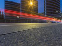 blurred photo of street lights and buildings along highway on a winter evening in the city