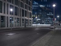 Nighttime in Berlin: Cityscape with Glass Building