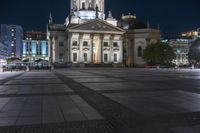 Nighttime in Berlin: Cityscape Lights Reflected in the Water