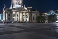 Nighttime in Berlin: Cityscape Lights Reflected in the Water