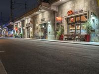 Nighttime in Berlin, Germany: City Streets Illuminated by Streetlights