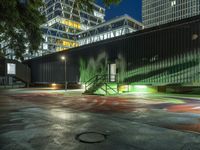 a parking lot with parking meter on the side of it at night under a canopy that lights up