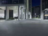 this is an image of a building at night with lights on outside the buildings and floor