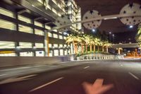 a street scene that is blurry with cars on it, and an image of palm trees