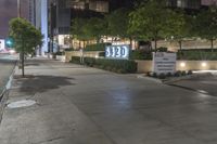 a city street with a sign stating the number 20 e on it's side