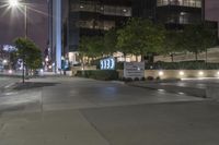 a city street with a sign stating the number 20 e on it's side