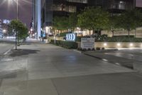 a city street with a sign stating the number 20 e on it's side