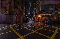 Nighttime Cityscape of Taipei 101: Neon Lights Illuminating the City