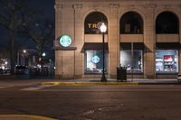 Nighttime Cityscape of Detroit: Illuminated by Street Lights