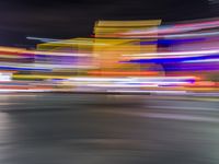 a motion blur photo of the night time scene of las vegas strip at las vegas