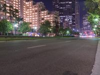 Nighttime in Los Angeles: A High-rise Skyscraper Amidst the City Lights