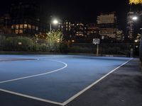 Nighttime Manhattan Skyline: Reflections and Urban Atmosphere