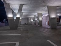 a parking garage area has multiple different sizes and shapes on it's ceiling lights