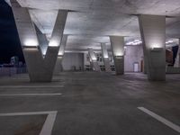 a parking garage area has multiple different sizes and shapes on it's ceiling lights