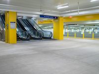 the empty car park with an escalator on the right and several escalators to either side