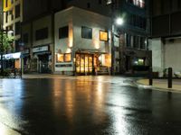 this is a shot of a restaurant at night with no one in it as if it is coming to the door