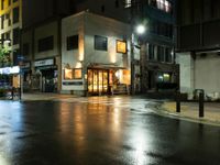 this is a shot of a restaurant at night with no one in it as if it is coming to the door