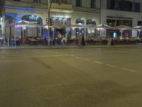 Nighttime Umbrella: Light Streaks in Berlin, Germany