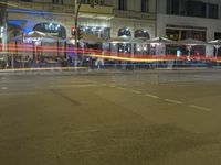 Nighttime Umbrella: Light Streaks in Berlin, Germany