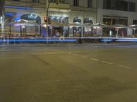 Nighttime Umbrella: Light Streaks in Berlin, Germany