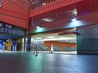 there are lights on the ceiling above a building as an empty mat lies in front of it