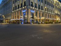 Nighttime View of Berlin Cityscape with Vibrant Neon Lights