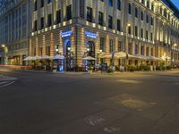 Nighttime View of Berlin Cityscape with Vibrant Neon Lights