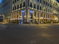 Nighttime View of Berlin Cityscape with Vibrant Neon Lights