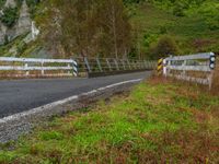 North Island's Bridge in a Cloudy Mountain Landscape