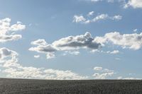 Ocean View: Blue Horizon and Clouds