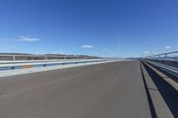 a view from a bicycle rider's point of view of a bridge crossing water